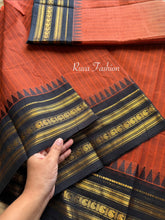 RF59 Rust Orange shade with contrast black Zari Border Kanchi cotton saree with striped pattern