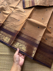 Beige shade Kanchi cotton saree with contrast Annam and lotus pattern border & handmade thread buttas
