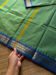 Vintage Podi Kattam ~ Dual tone Apple green shade with royal blue combination small checks Kanchi cotton saree