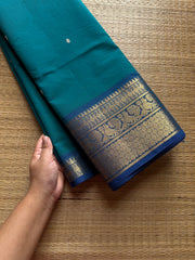 Dark teal blue Kanchi cotton saree with contrast royal blue border Annam pattern with handmade thread buttas