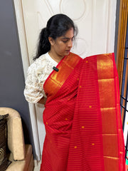 RF593 Classic Monotone Red shade & Intricate zari woven Vanasingaram Border with Vaira Oosi thread vertical lines pattern & handmade thread Buttas