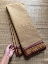 Cream shade with light brown small border Kanchi cotton saree