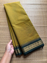Dual tone green small border Kanchi cotton saree