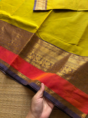 Lemon Yellow shade Kanchi cotton saree with contrast big Zari border