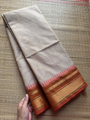 RF190 Cream shade with contrast light orange shade medium size border Kanchi cotton saree