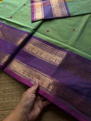 Apple green shade Kanchi cotton saree with handmade thread buttas