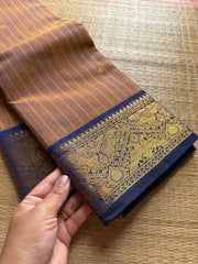 RF191 Dual tone mustard brown With contrast navy blue combination Vanasingaram border Kanchi cotton saree with striped pattern & handmade thread buttas