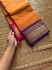 Dark Mango shade with contrast purple & pink combo Ganga Jamuna border Kanchi cotton saree with handmade thread buttas
