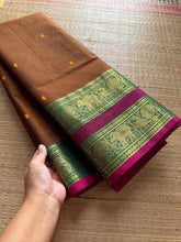 RF252 Dark Honey shade with contrast green and pink combination Rettapet border Kanchi cotton saree with handmade thread buttas