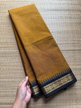 Mustard with black combination small border Kanchi cotton saree