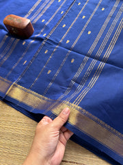 Monotone royal blue shade small border Kanchi cotton saree with handmade golden Zari Buttas