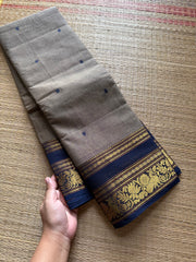 Grey Kanchi Cotton Saree With Contrast Navy Blue Shade Annam & lotus pattern border and handmade thread buttas