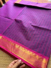 Purple shade with contrast small pink zari small Thazhampoo border Kanchi cotton saree with rich Zari woven Pallu & hand made Zari Buttas