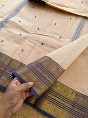 RF164 Cream shade Kanchi cotton saree with contrast medium size light blue shade Zari border and handmade thread buttas