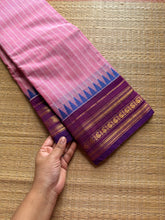 Pastel pink with contrast purple combination Kanchi cotton saree with vertical stripped pattern & mango Zari border