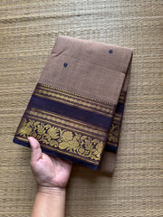 Dual tone biscuit shade Kanchi cotton saree with Annam & lotus pattern contrast border and handmade thread buttas