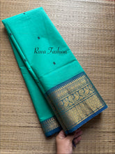 Aqua Blue Shade Kanchi Cotton Saree With Handamade thread Buttas