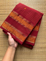 RF483 The Reddish Maroon Kattam Edition: Kanchi Cotton Saree with Minimal Zari & handmade thread buttas