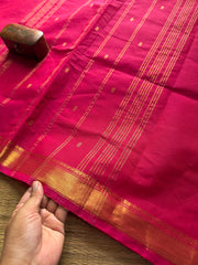 Monotone pink shade small border Kanchi cotton saree with handmade golden Zari Buttas