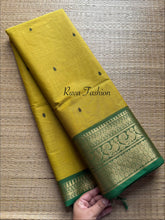 Mustard yellow tone with contrast green Zari border Kanchi cotton saree with handmade thread buttas