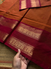 Orange shade Kanchi cotton saree with handmade thread buttas