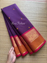 Purple shade Kanchi cotton saree with contrast red and orange combination with handmade thread buttas