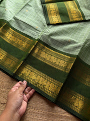 RF1338 Kattam Edition ~ Light pista green shade Kanchi cotton saree with handmade golden Zari buttas