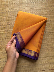 RF204 Dark Mango shade with contrast small purple shade Zari border Kanchi cotton saree