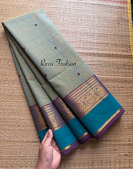 Dual shade of light dusty olive shade Kanchi cotton saree with contrast border and handmade thread buttas