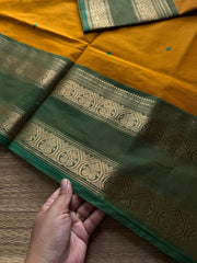 Yellow with green combination Kanchi cotton saree with handmade thread buttas