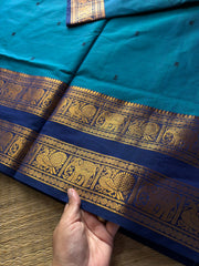 RF700 Peacock blue shade Kanchi cotton saree with Rettapet border & handmade thread buttas