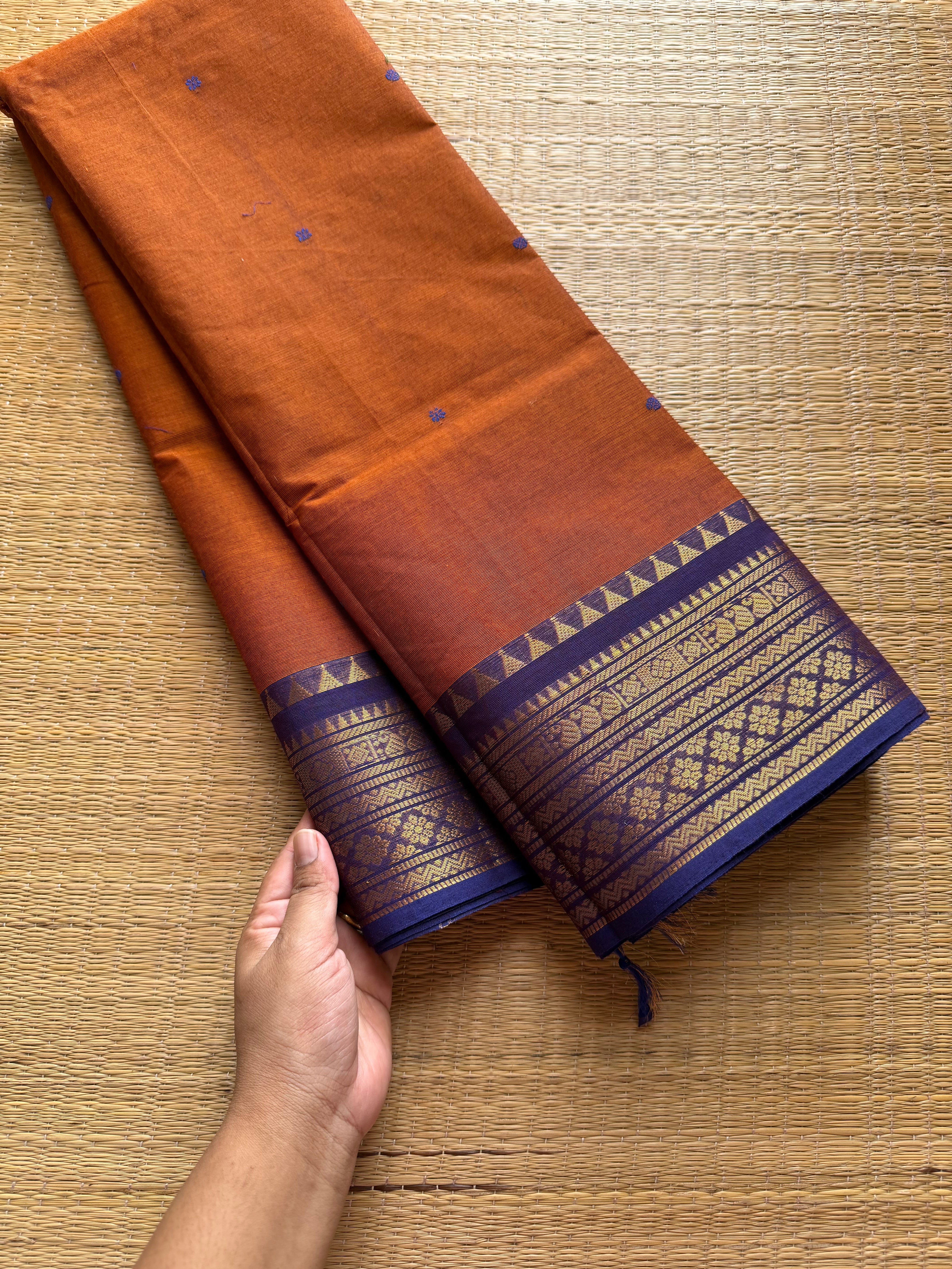 Orange with royal blue combination Kanchi cotton saree with handmade thread buttas