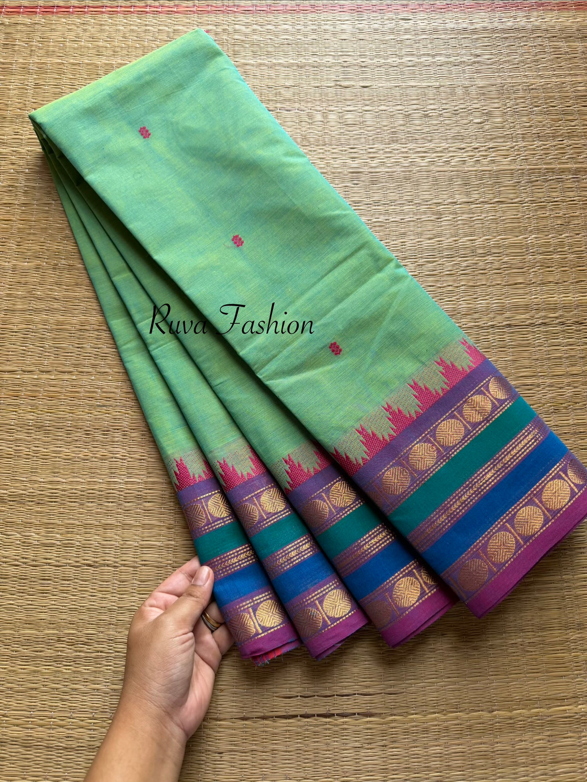 Dual tone Apple Green Shade Kanchi Cotton Saree With Contrast & unique multi color border with small Thazhampoo pattern