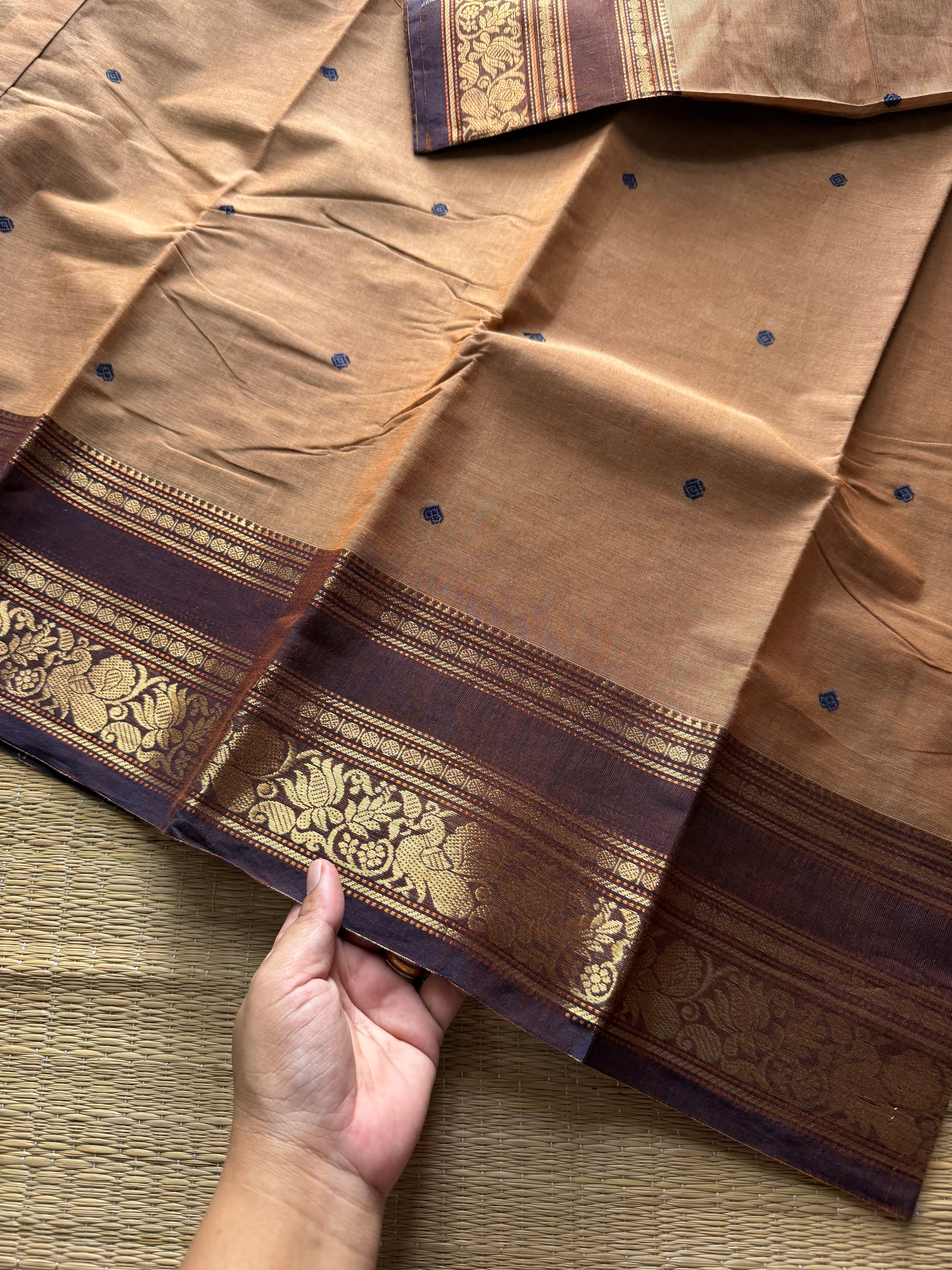 Beige shade Kanchi cotton saree with contrast Annam and lotus pattern border & handmade thread buttas