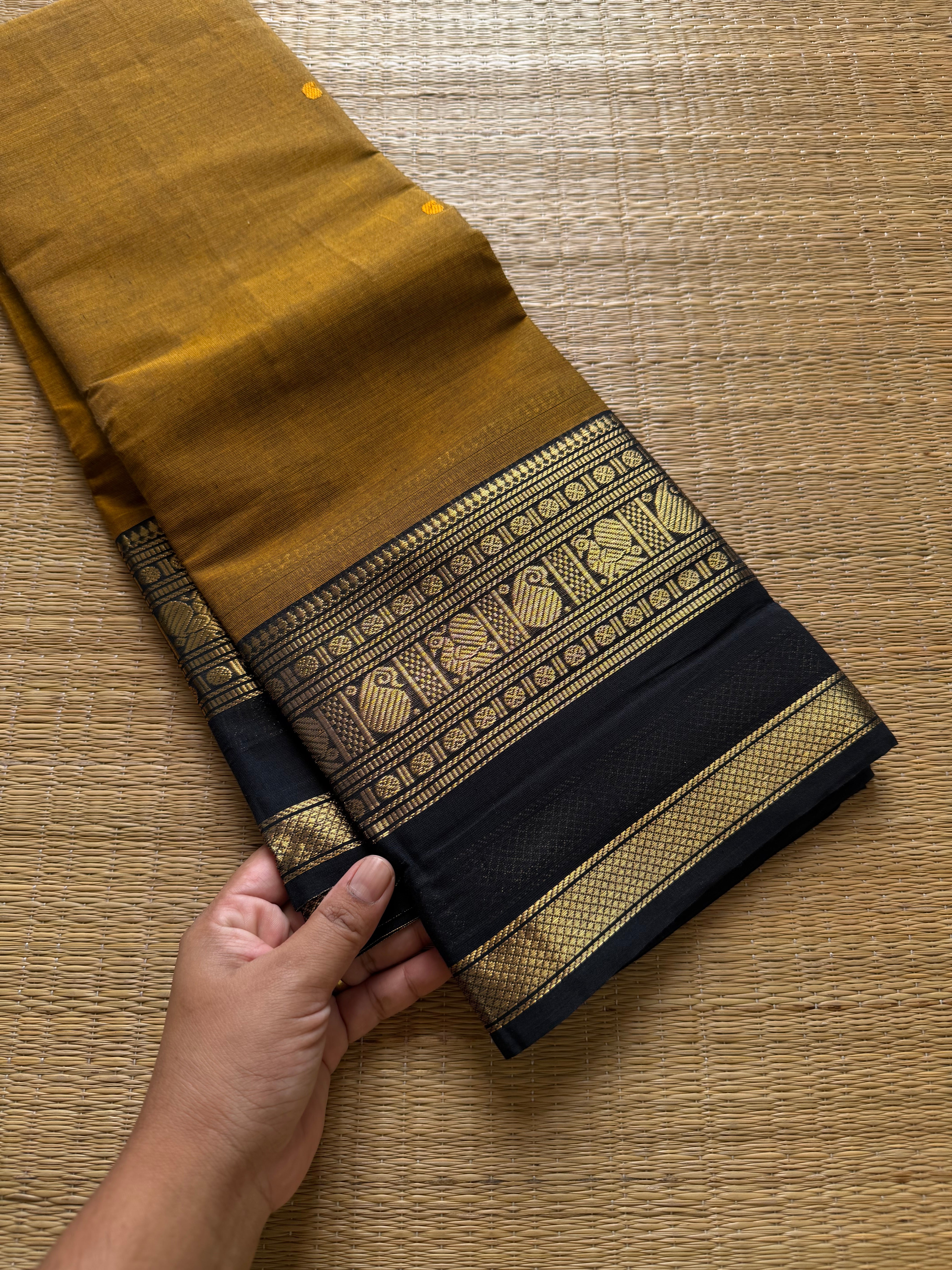 RF703 Mustard with black combination Kanchi cotton saree with handmade thread buttas