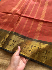 Rust orange shade podi kattam Kanchi cotton saree with Annam golden Zari border