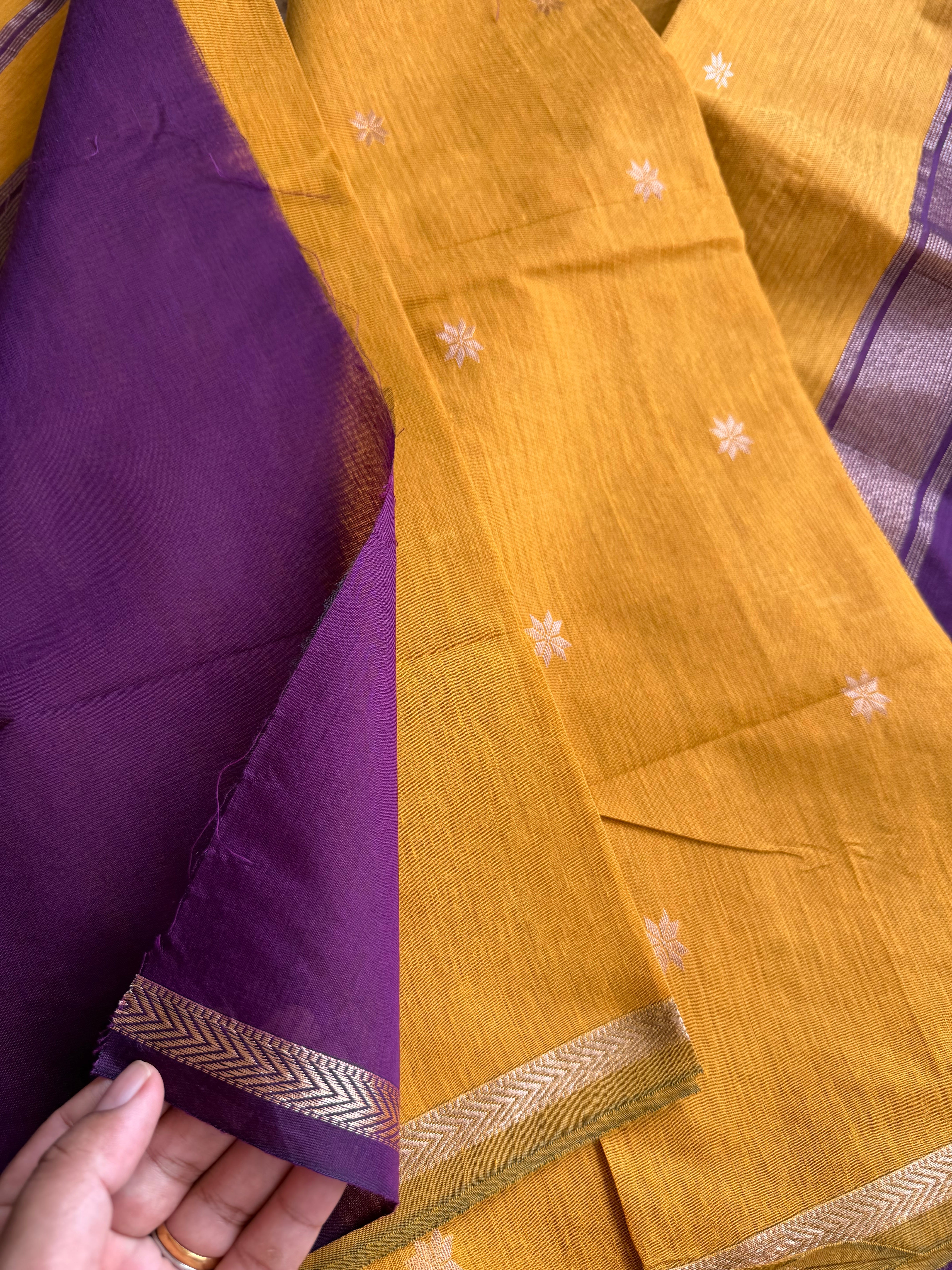 RF155 Mustard yellow body paired with a deep purple contrast border and pallu Maheswari Semi Silk Cotton Saree with star pattern Zari Buttas