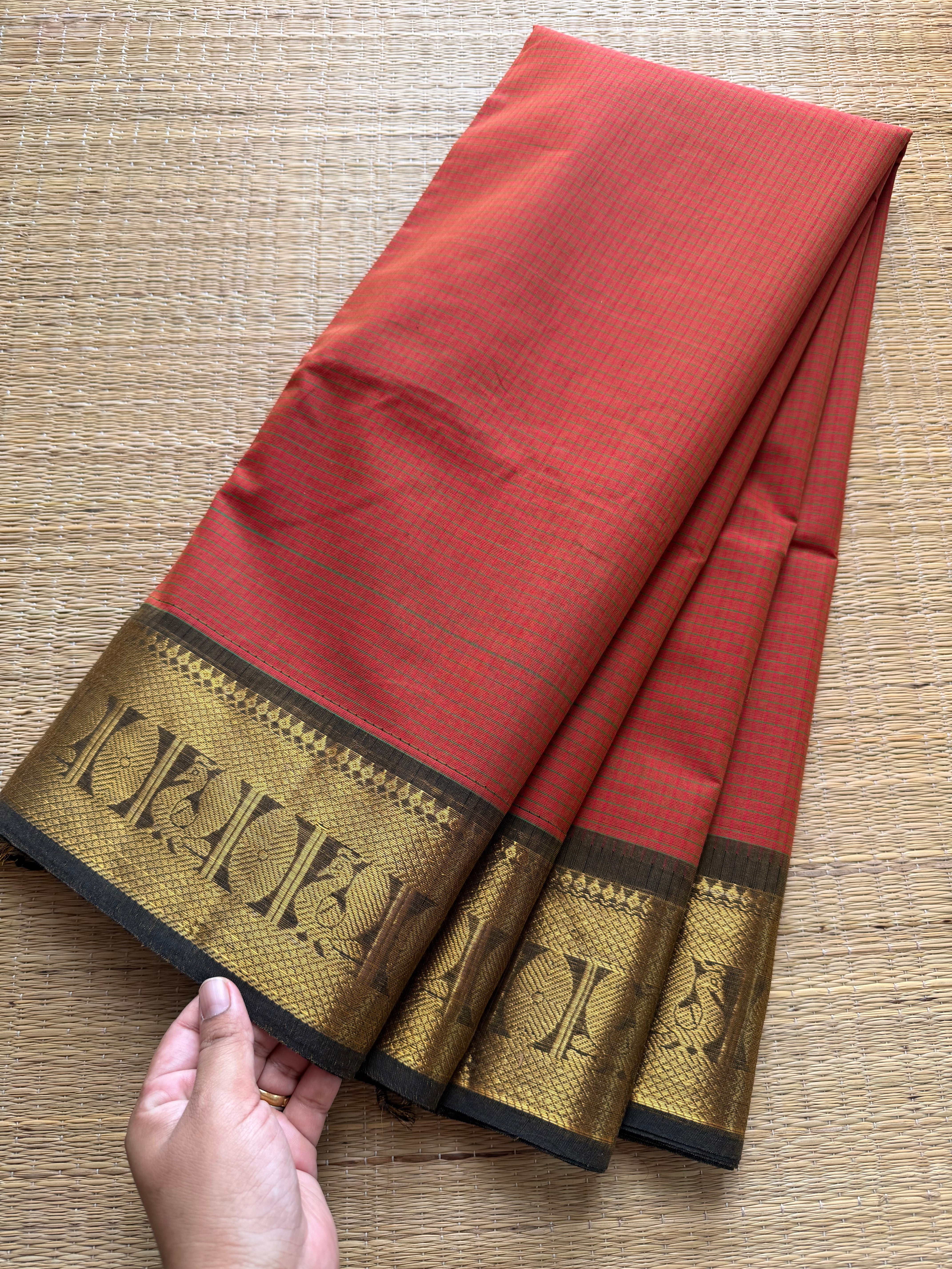 Rust orange shade podi kattam Kanchi cotton saree with Annam golden Zari border