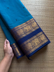 RF700 Peacock blue shade Kanchi cotton saree with Rettapet border & handmade thread buttas