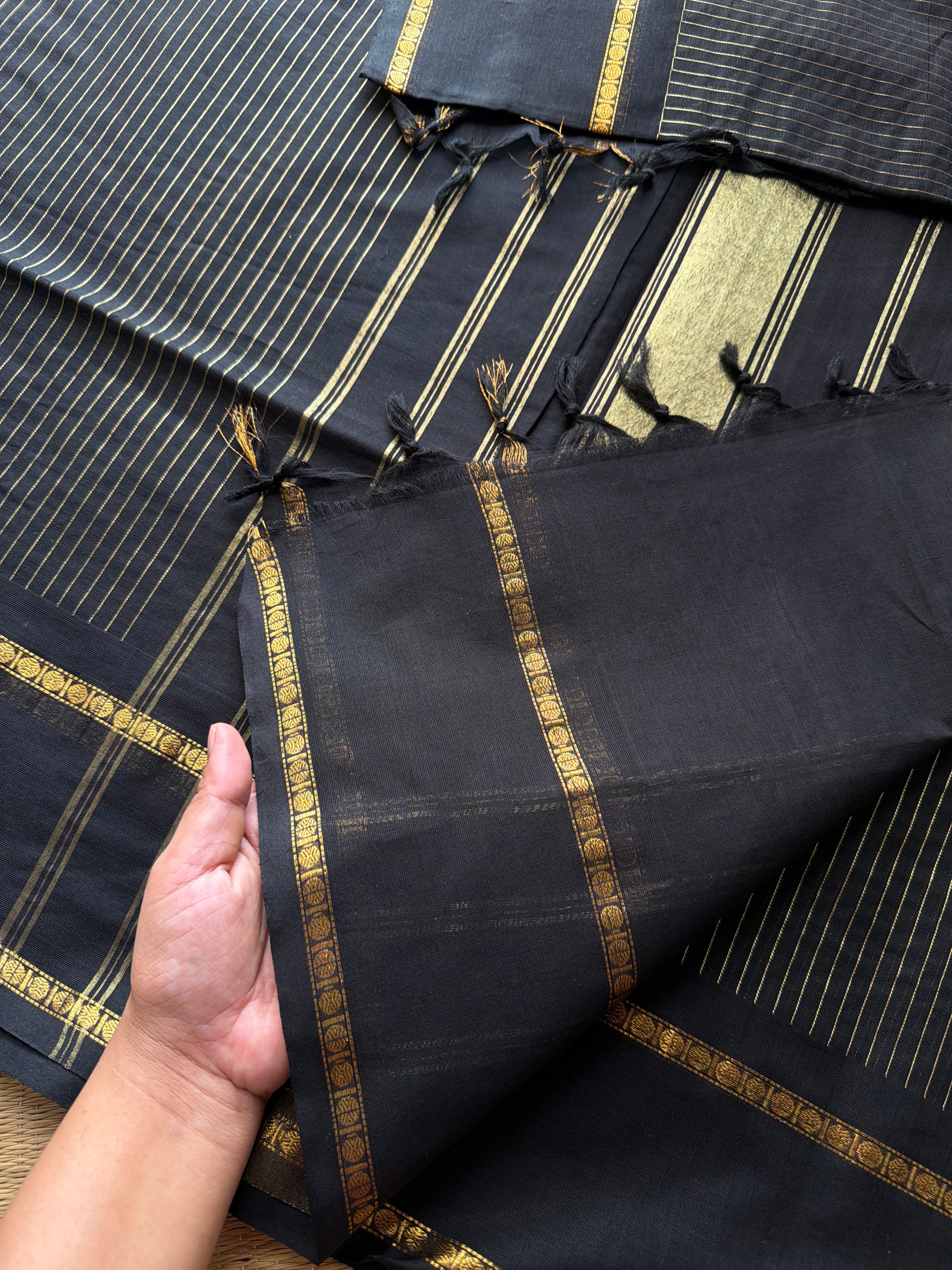 Monotone black shade Kanchi cotton saree with vintage gap border and fully golden Vairaoosi pattern