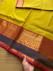 Mustard yellow shade Kanchi cotton saree with contrast big Zari border