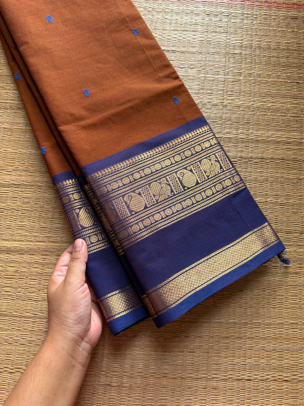 Honey shade with blue combination Kanchi cotton saree with handmade thread buttas