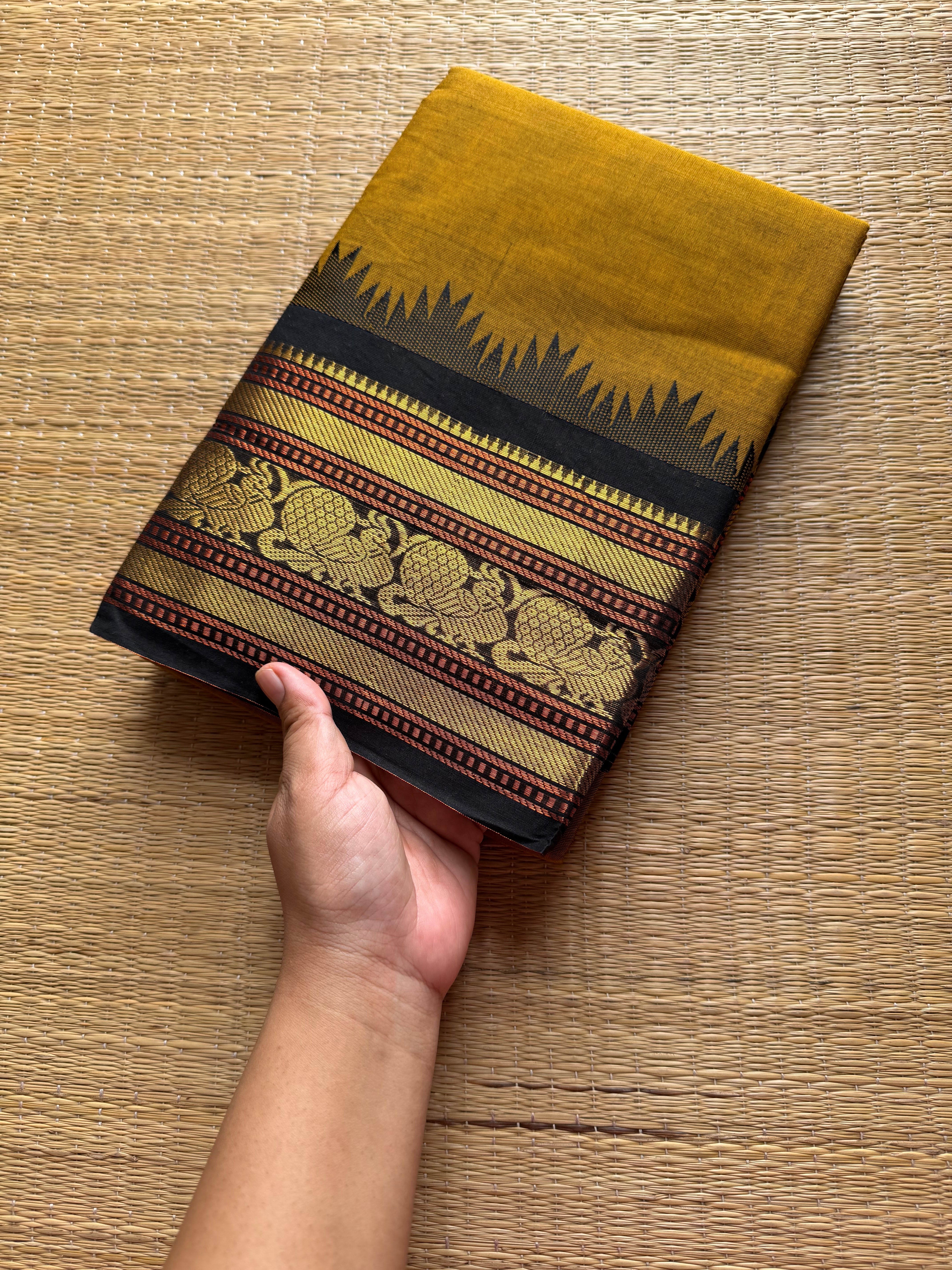 RF493 Mustard with black combination Thazhampoo pattern Kanchi cotton saree