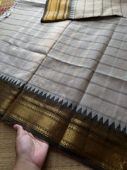 Cream shade kanchi saree with kattam / checks pattern & handmade golden Zari buttas