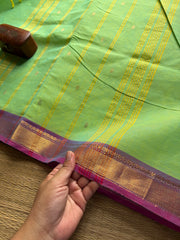 Dual tone Apple green shade with purple combination small border Kanchi cotton saree with handmade golden Zari Buttas