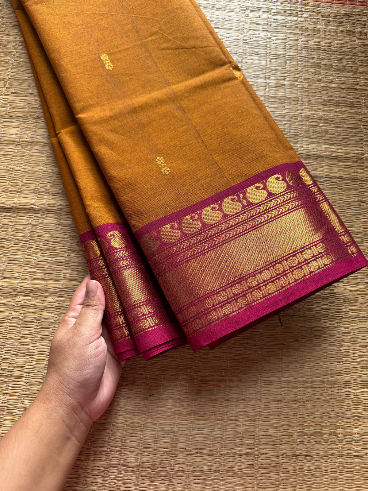 Mustard with pink combination Kanchi cotton saree with handmade golden Zari Buttas