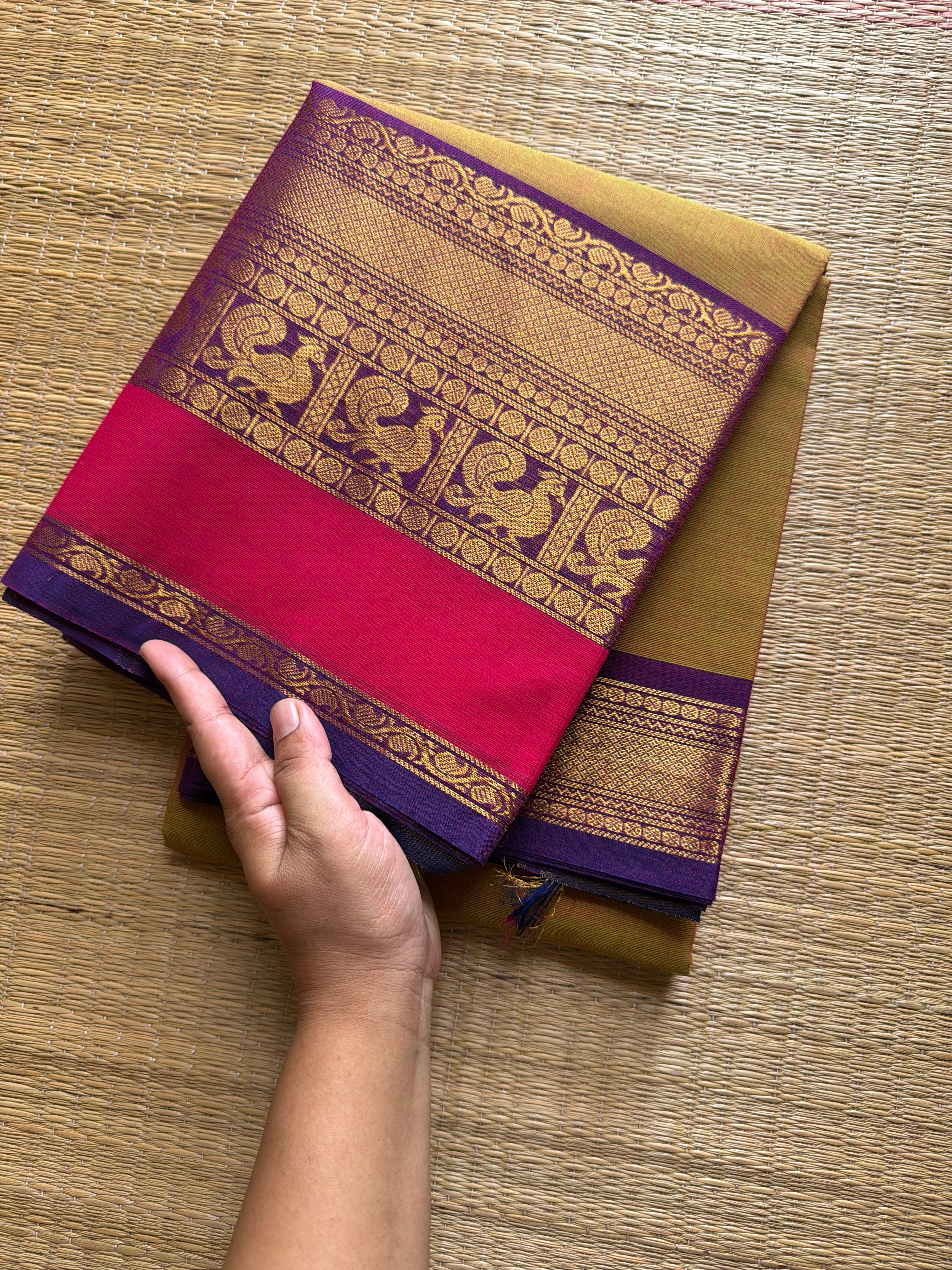 Yellow and green mixed shade Kanchi cotton saree with big Zari border