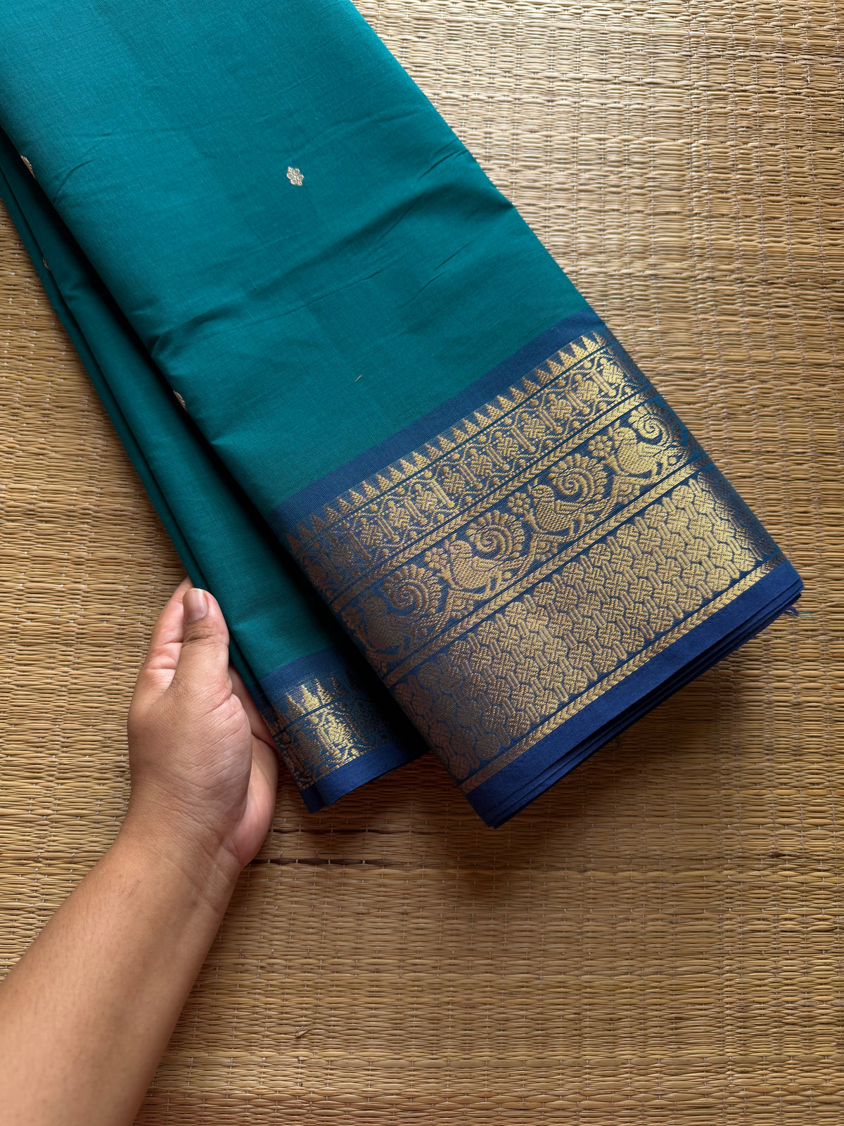 Dark teal blue Kanchi cotton saree with contrast royal blue border Annam pattern with handmade thread buttas