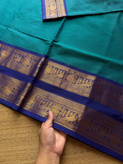 Peacock blue shade Kanchi cotton saree with Rettapet border