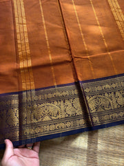 Rust orange shade Kanchi cotton saree with silk saree inspired Annam and elephant pattern border